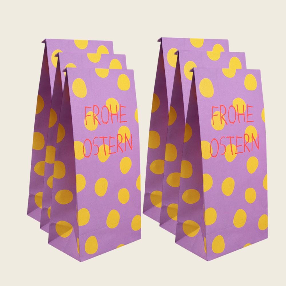 Papiergeschenktüte Punkte gelb/flieder – Frohe Oster, Ava & Yves